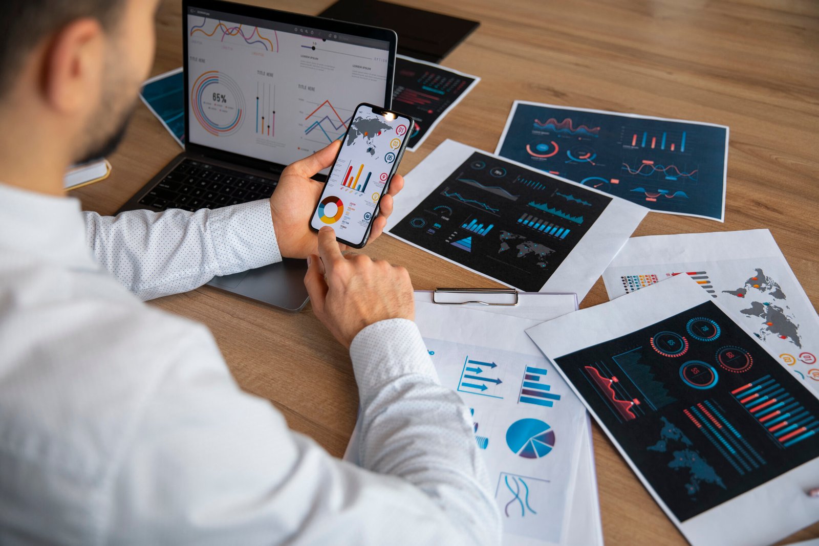 office workers using finance graphs (1)